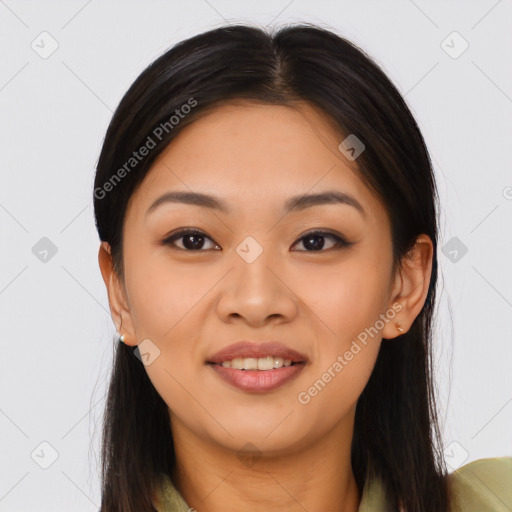 Joyful asian young-adult female with long  brown hair and brown eyes