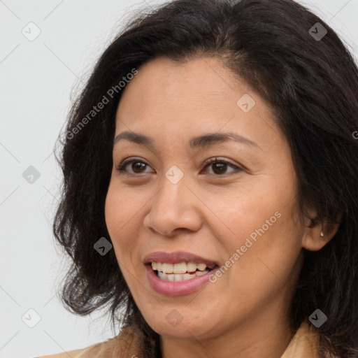 Joyful white adult female with long  brown hair and brown eyes