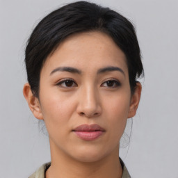 Neutral asian young-adult female with medium  black hair and brown eyes