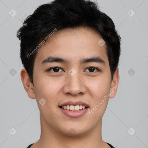 Joyful white young-adult male with short  black hair and brown eyes