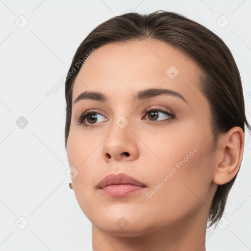 Neutral white young-adult female with medium  brown hair and brown eyes