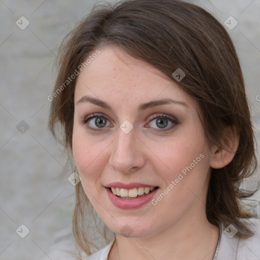 Joyful white young-adult female with medium  brown hair and blue eyes