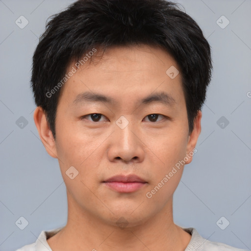 Neutral asian young-adult male with short  black hair and brown eyes