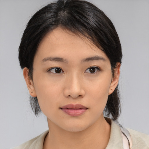 Neutral asian young-adult female with medium  black hair and brown eyes