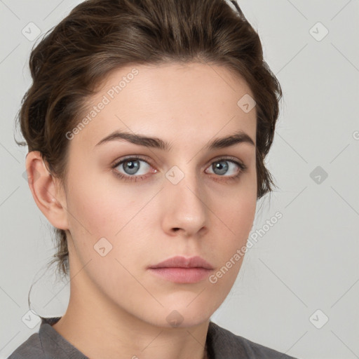 Neutral white young-adult female with medium  brown hair and grey eyes