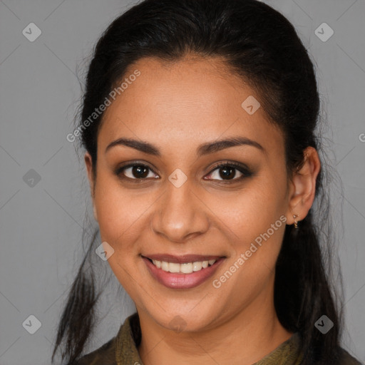 Joyful latino young-adult female with long  brown hair and brown eyes