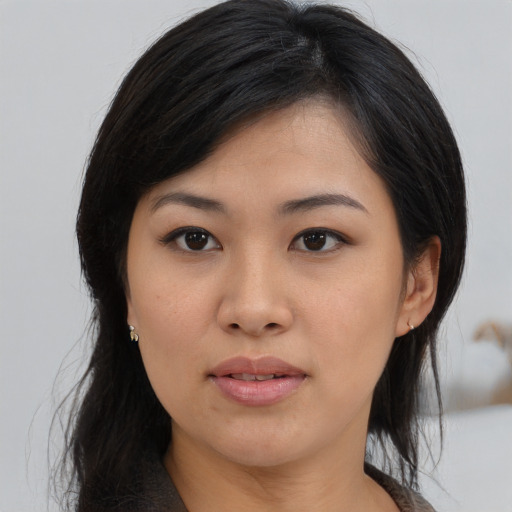 Neutral asian young-adult female with medium  black hair and brown eyes