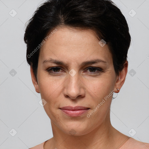 Joyful white adult female with short  brown hair and brown eyes