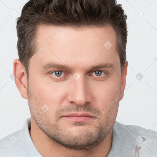 Neutral white young-adult male with short  brown hair and grey eyes