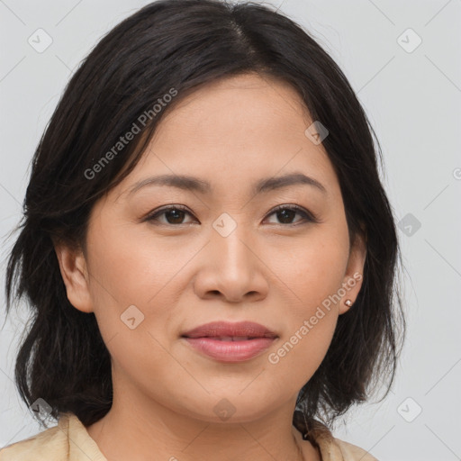 Joyful asian young-adult female with medium  brown hair and brown eyes