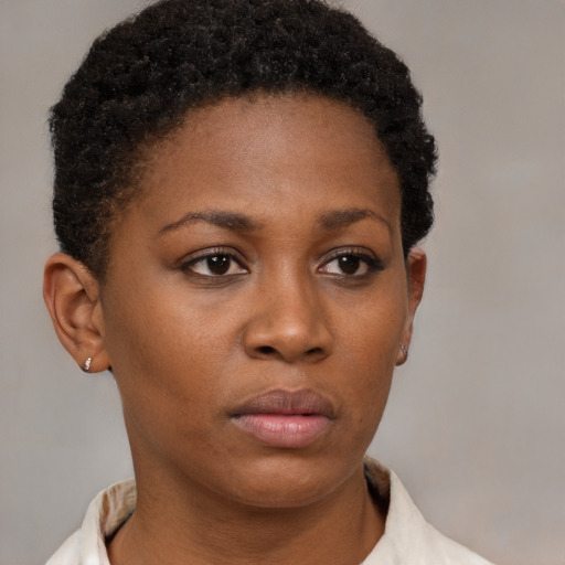 Neutral black young-adult female with short  brown hair and brown eyes