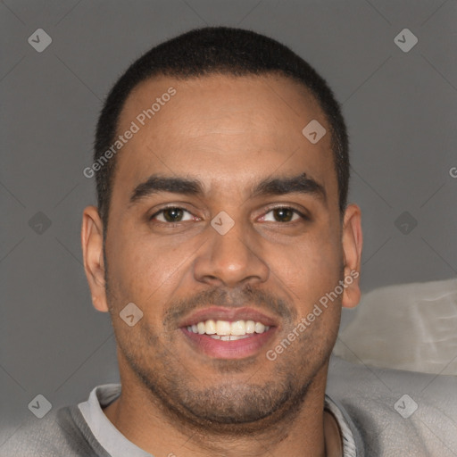 Joyful latino young-adult male with short  brown hair and brown eyes