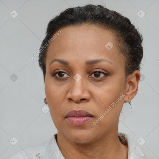 Neutral black adult female with short  brown hair and brown eyes