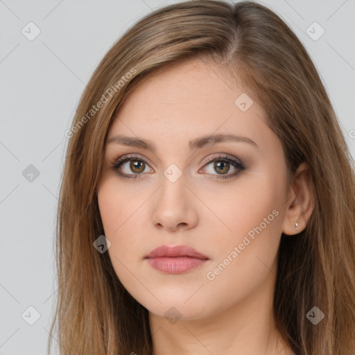 Neutral white young-adult female with long  brown hair and brown eyes