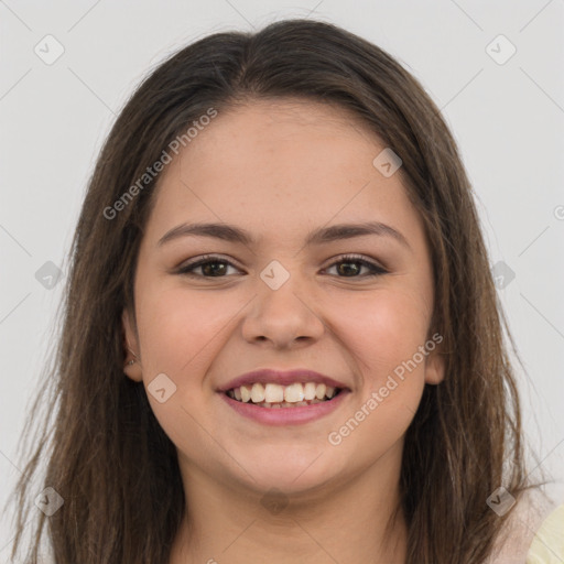 Joyful white young-adult female with long  brown hair and brown eyes