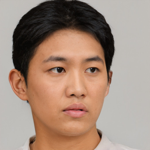 Neutral asian young-adult male with short  black hair and brown eyes