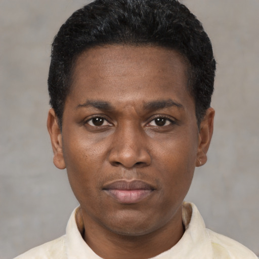 Neutral black young-adult male with short  black hair and brown eyes