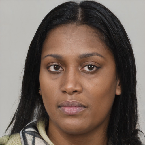 Neutral latino young-adult female with long  brown hair and brown eyes