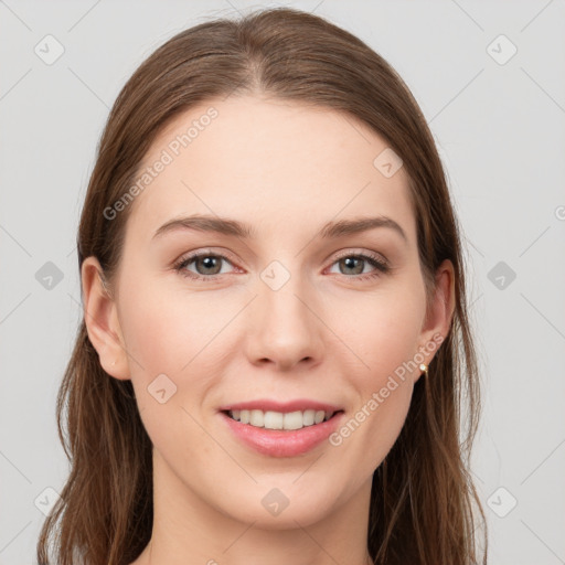 Joyful white young-adult female with long  brown hair and grey eyes