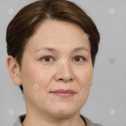 Joyful white adult female with short  brown hair and brown eyes