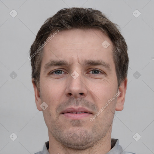 Neutral white adult male with short  brown hair and brown eyes