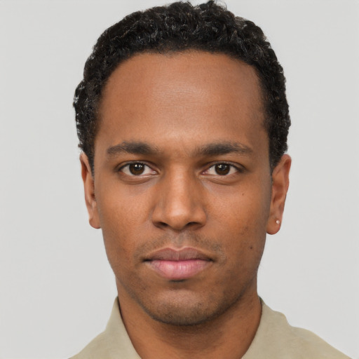 Neutral black young-adult male with short  black hair and brown eyes
