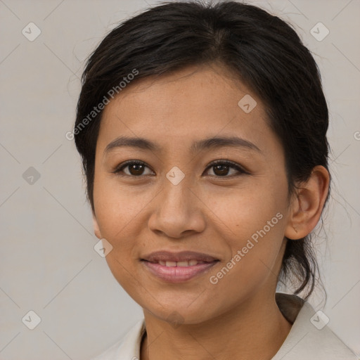 Joyful white young-adult female with medium  brown hair and brown eyes