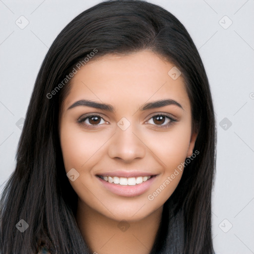 Joyful latino young-adult female with long  brown hair and brown eyes