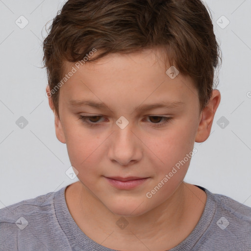 Joyful white child male with short  brown hair and brown eyes