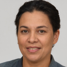 Joyful white adult female with short  brown hair and brown eyes