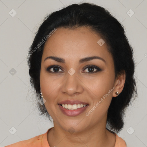 Joyful latino young-adult female with long  black hair and brown eyes