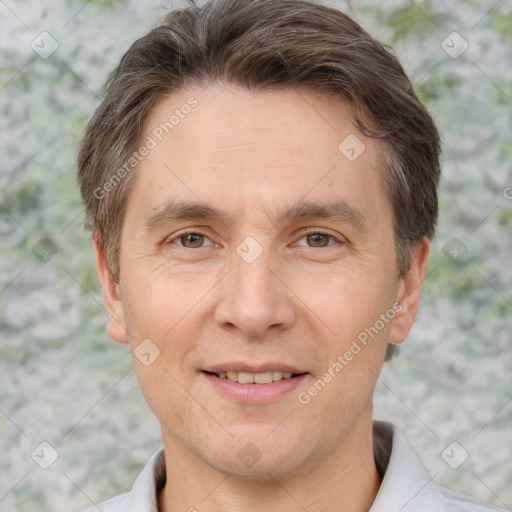 Joyful white adult male with short  brown hair and grey eyes