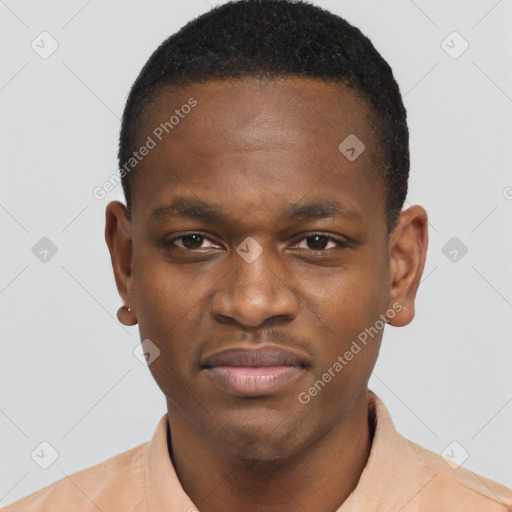 Joyful black young-adult male with short  brown hair and brown eyes