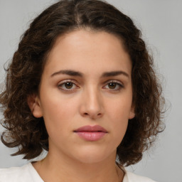 Neutral white young-adult female with medium  brown hair and brown eyes