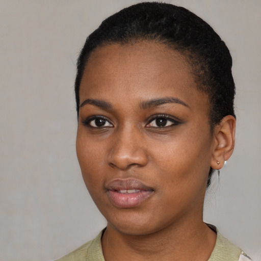 Neutral black young-adult female with short  black hair and brown eyes