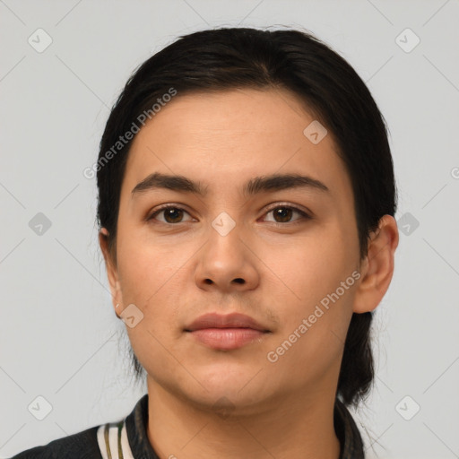 Neutral latino young-adult female with short  black hair and brown eyes