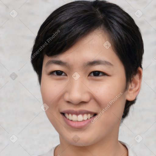 Joyful asian young-adult female with medium  black hair and brown eyes