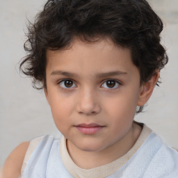 Joyful white child male with short  brown hair and brown eyes