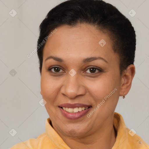 Joyful latino adult female with short  brown hair and brown eyes