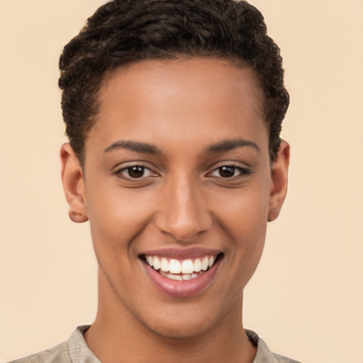 Joyful latino young-adult female with short  brown hair and brown eyes