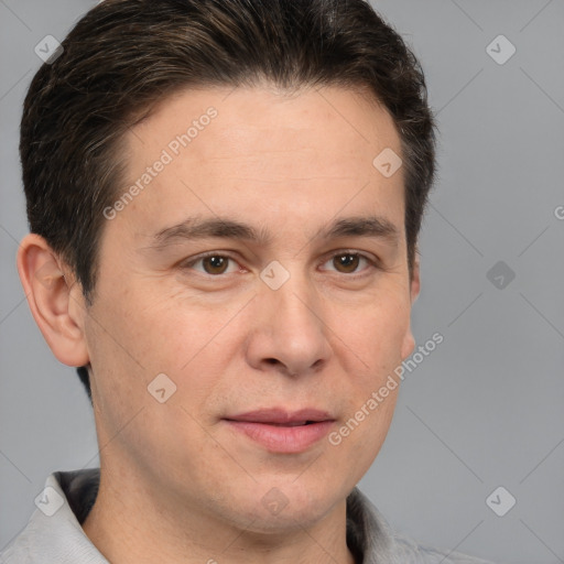 Joyful white adult male with short  brown hair and brown eyes