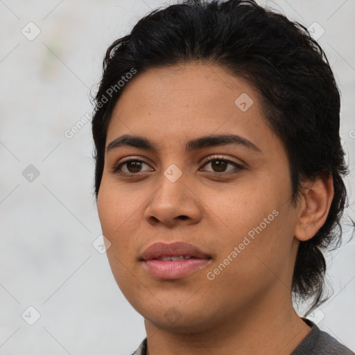 Joyful asian young-adult female with medium  black hair and brown eyes