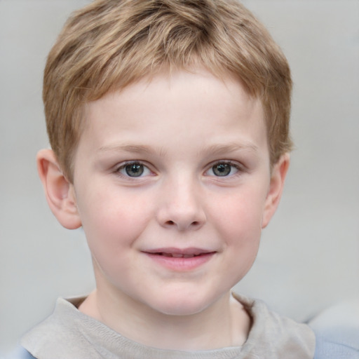 Joyful white child male with short  brown hair and grey eyes