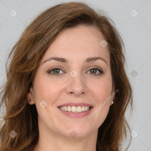 Joyful white young-adult female with long  brown hair and green eyes