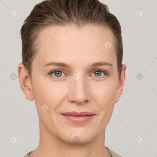 Joyful white young-adult female with short  brown hair and grey eyes