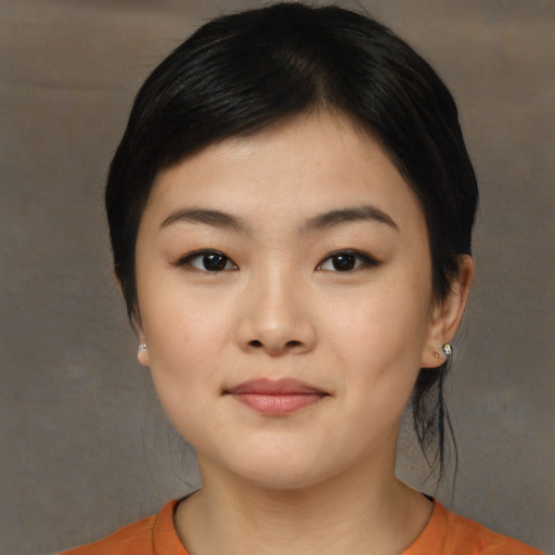 Neutral asian young-adult female with medium  black hair and brown eyes