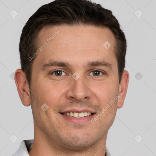 Joyful white young-adult male with short  brown hair and brown eyes