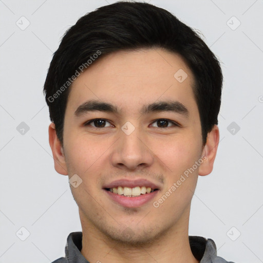 Joyful white young-adult male with short  black hair and brown eyes