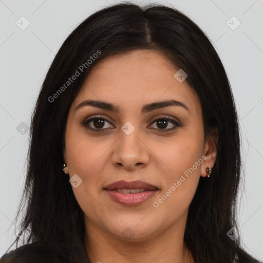 Joyful latino young-adult female with long  brown hair and brown eyes