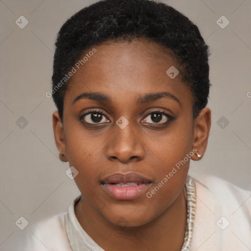 Joyful black young-adult female with short  brown hair and brown eyes